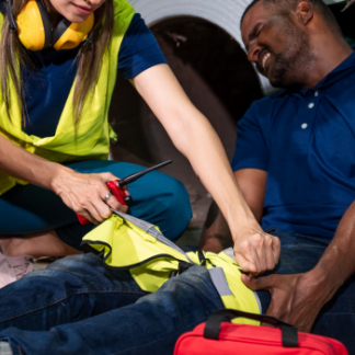 aed and manikin on table